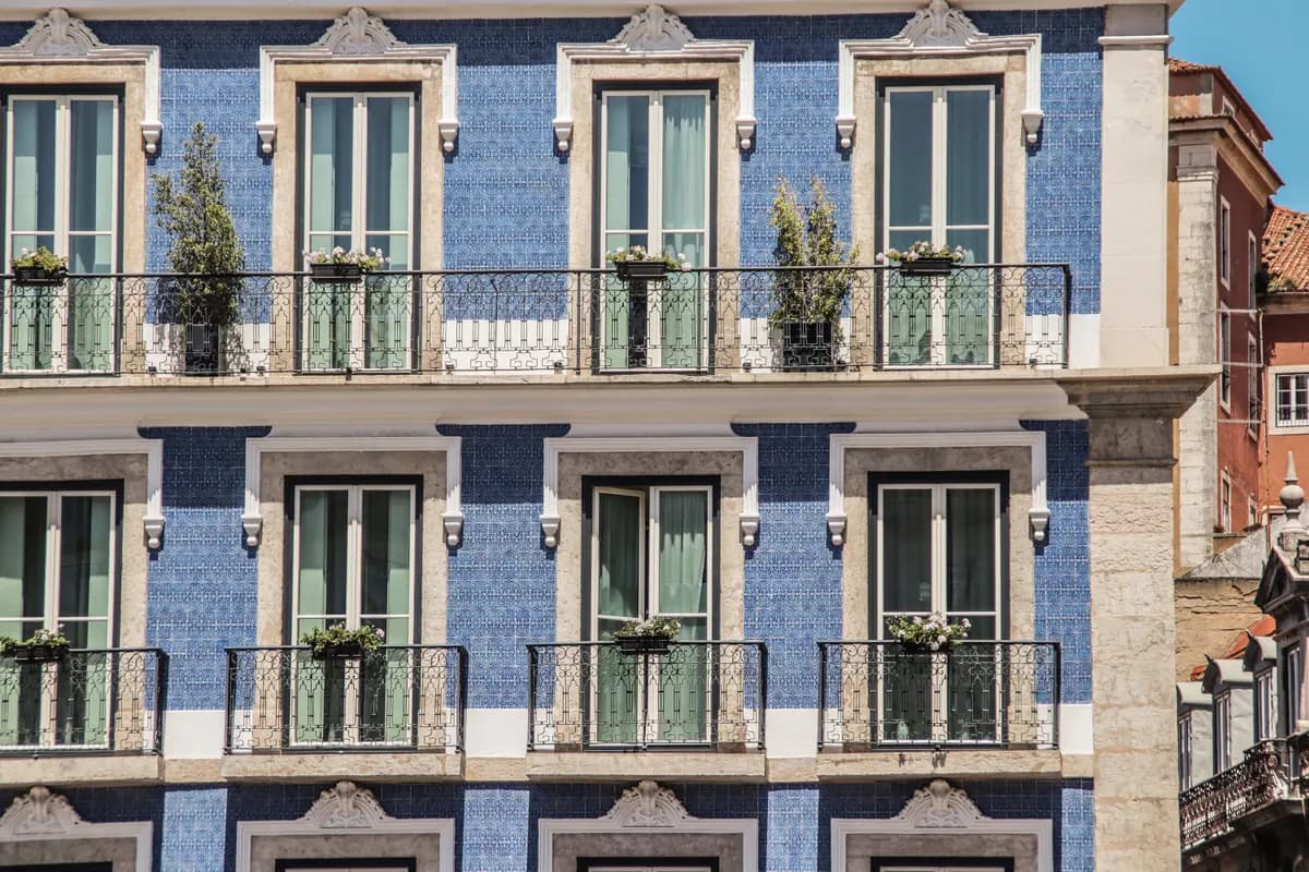 A tiled building facade on a Lisbon street